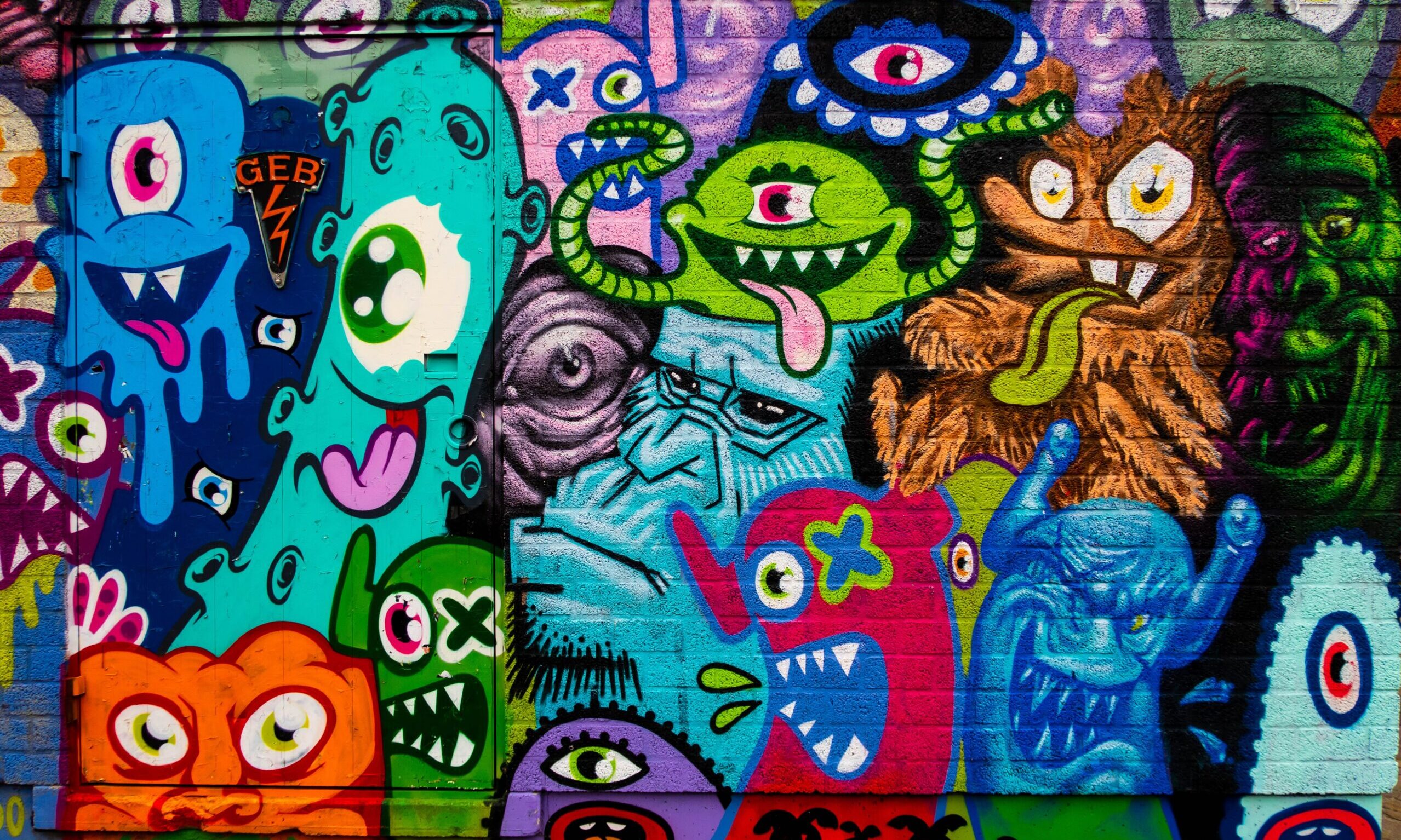 Graffiti wall covered in fun and colorful monsters